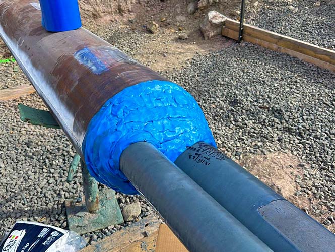 VISCOTAQ ViscoMastic used to fill and profile steel carrier pipe prior to the application of ViscoWrap ST