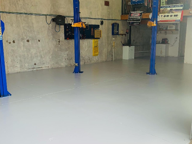 Denso ST Epoxy coating applied to a mechanic's floor